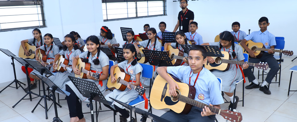 Playing Guitar at KLE MR Sakhare